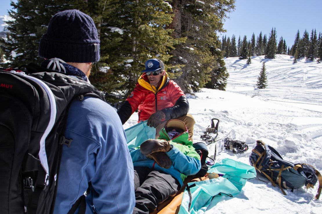 San Juan Expeditions guide teaching rescue sled construction to students